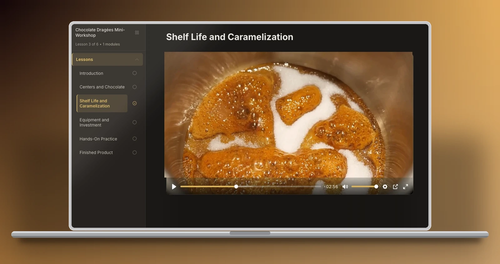 Real class inside the academy, lesson 3: sugar caramelizing over the nuts, in close-up.